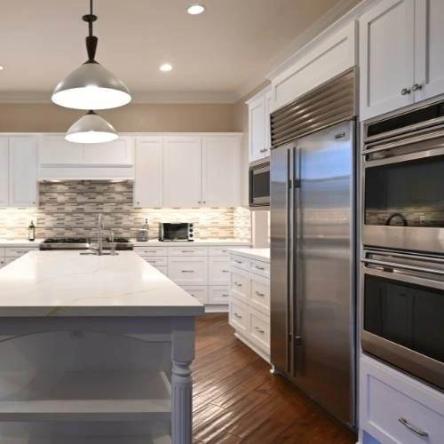 Kitchen remodel by Ofir Construction — modern cabinets and stone countertops