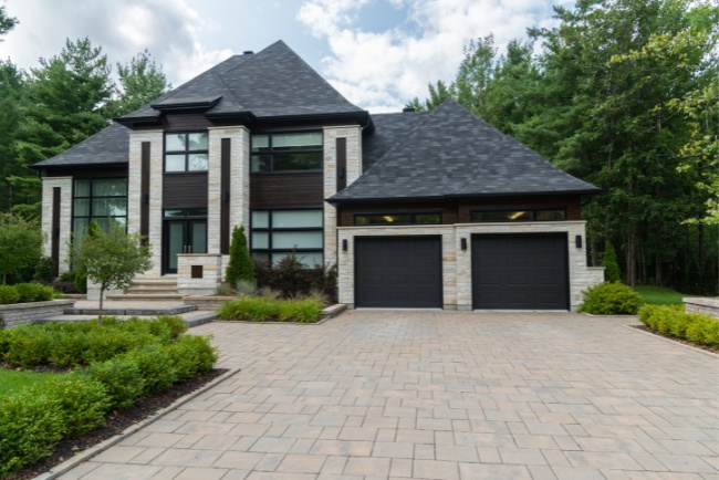 Custom affordable homes featuring modern design and lush landscaping in a serene suburban setting