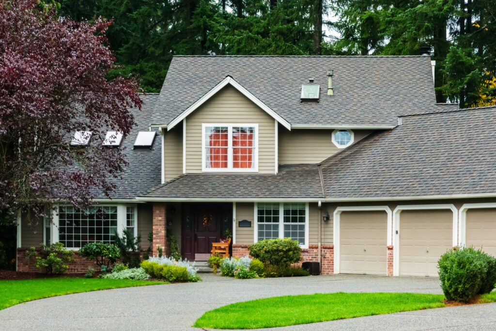 Custom built family home surrounded by lush greenery in a quiet neighborhood