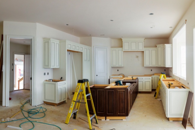 Design Build Services for Modern Kitchen Renovation in Progress with High-Quality Cabinets