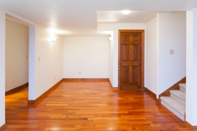 Transforming a basement into a cozy living space with elegant finishes and quality craftsmanship