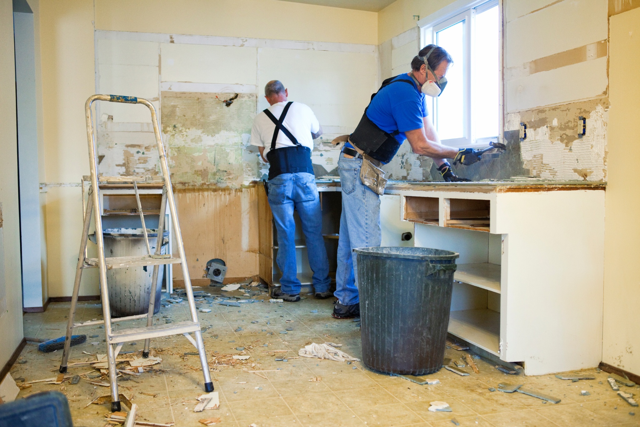 Home renovation contractors working on a kitchen remodel 