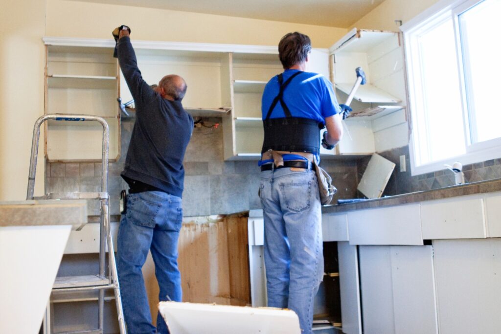 Workers remodeling a kitchen